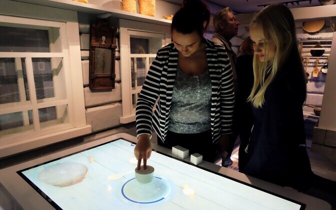 Museum visitors checking out one of the many interactive displays.