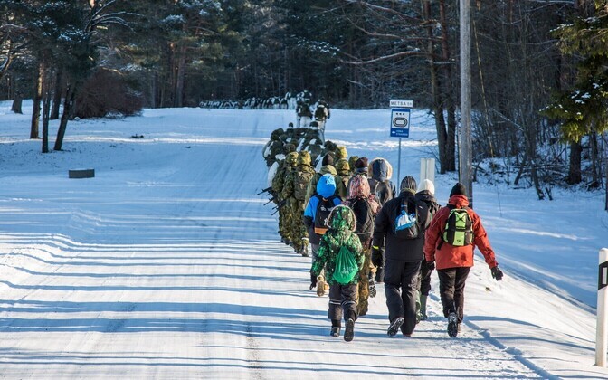 Local schoolchildren join U.S. and Estonian soldiers on the Winter March. Feb. 7, 2017.