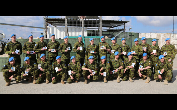 Estonian peacekeepers of the ESTPLA-24 platoon in Lebanon celebrate the Estonian centennial.