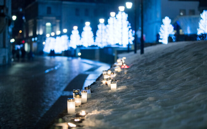 Candles lit along Tallinn's Harju Street commemorating the March Bombing of 1944.
