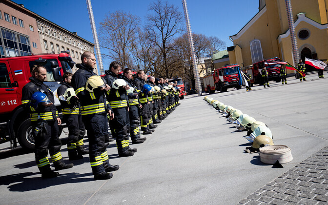 Estonian rescue workers commemorate Ukrainian rescue workers killed during the war in Ukraine on May 4, 2022.