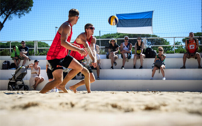 Estonia's Kusti Nõlvak and Mart Tiisaar (yellow vests) in action in the world beach volleyball championships in Rome, Italy.