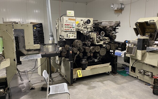 Photos of a counterfeit cigarette factory busted in a recent search of a production building in Saku Municipality. January 2023.