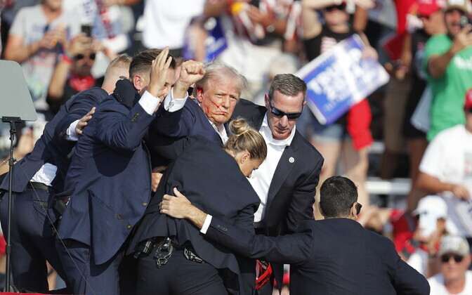 Фотографии с предвыборного мероприятия, на котором было совершено покушение на Дональда Трампа.