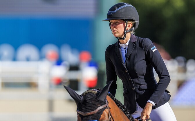 Ми Реландер и лошадь Эксперт на Олимпиаде в Париже.