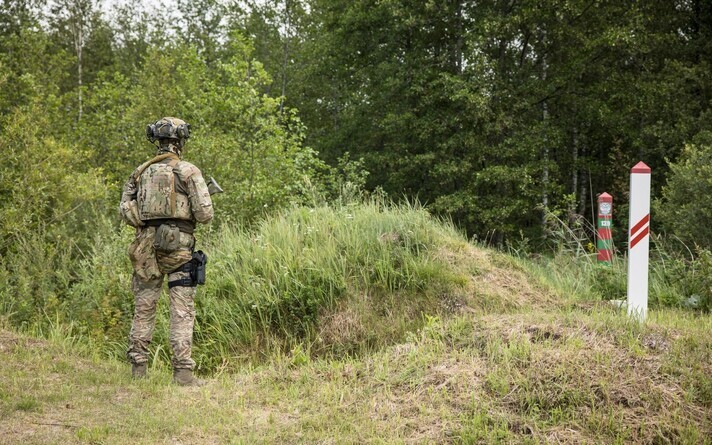 A border guard on the Latvian-Belarusian border.