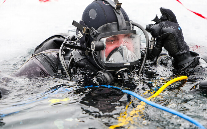 Divers from the Estonian Navy and US Navy construction workers complete a week-long 