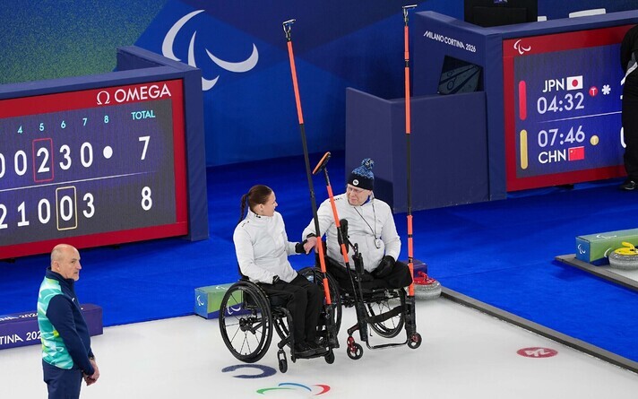 Kätlin Riidebach ja Ain Villau Milano Cortina taliparalümpiamängudel.